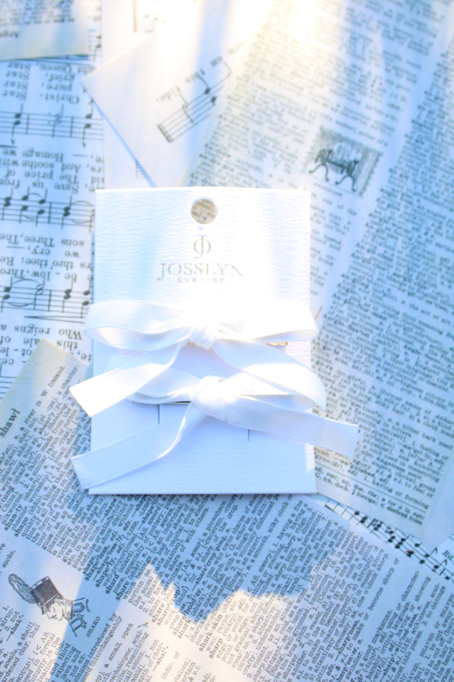 white satin bow clip