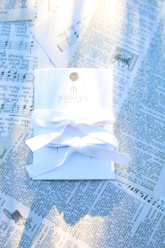 white satin bow clip
