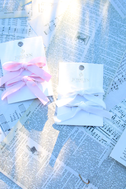 white satin bow clip